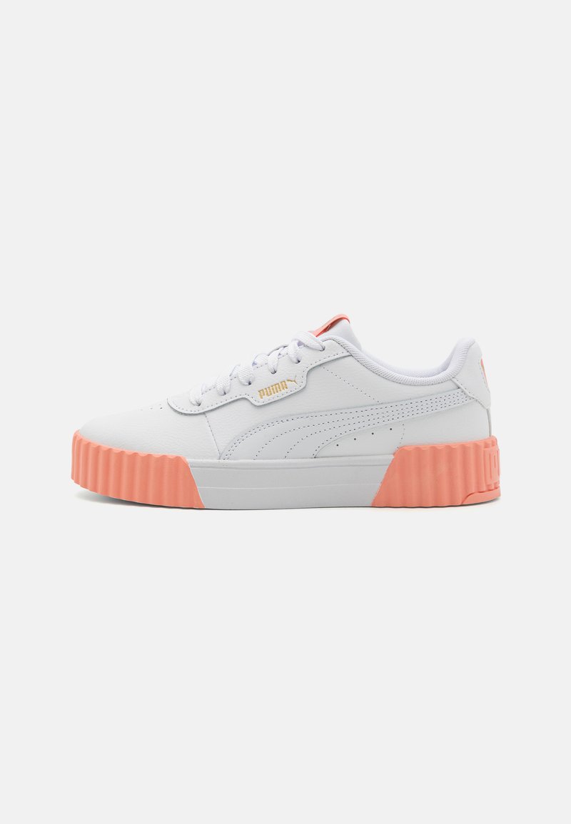 White sneaker with textured leather upper, pink rubber platform sole, and white laces. Features gold logo and subtle side detailing.