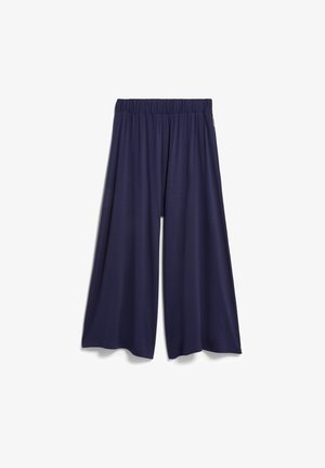 Marineblaue, weit geschnittene, verkürzte Hose mit elastischem Bund, aus leichtem, fließendem Stoff gefertigt.