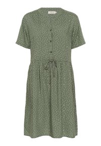 Grön klänning med korta ärmar, rund halsringning, knäppning fram och dragsko i midjan. Har vita prickar och en avslappnad passform.
