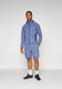 Nike Performance PARIS SAINT-GERMAIN TECH WINDRUNNER - Klub merchandise - diffused blue/white