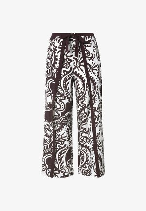 Pantaloni a gamba ampia con un audace motivo astratto in bianco e nero. Realizzati in tessuto leggero con cintura legata in vita e accenti laterali.