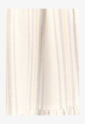 Tessuto bianco con strisce verticali in beige chiaro e blu navy. Presenta una trama strutturata e un orlo arricciato sottile sul fondo.