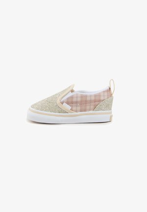 Glittery gold slip-on shoes with a light pink plaid fabric at the back. White rubber sole with a textured grip. No laces, easy to wear.