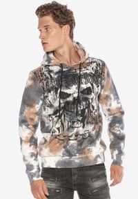 Kapuzensweatshirt im Batik-Muster in Grau und Braun, mit einem großen Totenkopf-Graphic. Hergestellt aus weichem Material, mit Kordelzügen und gerippten Bündchen.