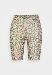 Korkeavyötäröiset pyöräilyshortsit, joissa on pieniä kukkakuoseja punaisessa, valkoisessa ja vihreässä tummanvihreällä taustalla.