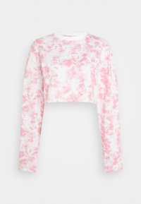 Top cropped de manga longa em mistura de cotton suave, apresentando um padrão tie-dye em rosa e branco, e um decote redondo com um acabamento branco.
