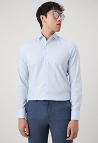OLYMP Level Five Alkalmi ing - bleu