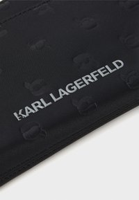 KARL LAGERFELD IKON WRIST POUCH - Ručna torbica - black