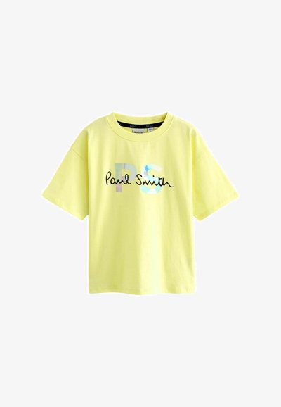 Geltona medvilnė T-maišas trumpomis rankovėmis; jame yra grafinis užrašas "PS" keliomis spalvomis ir "Paul Smith" juodu itališku šriftu.
