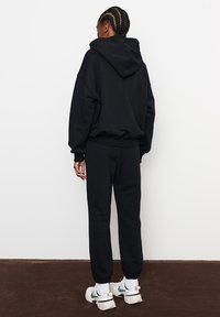 LA MANIA Treningo apatinė dalis - black