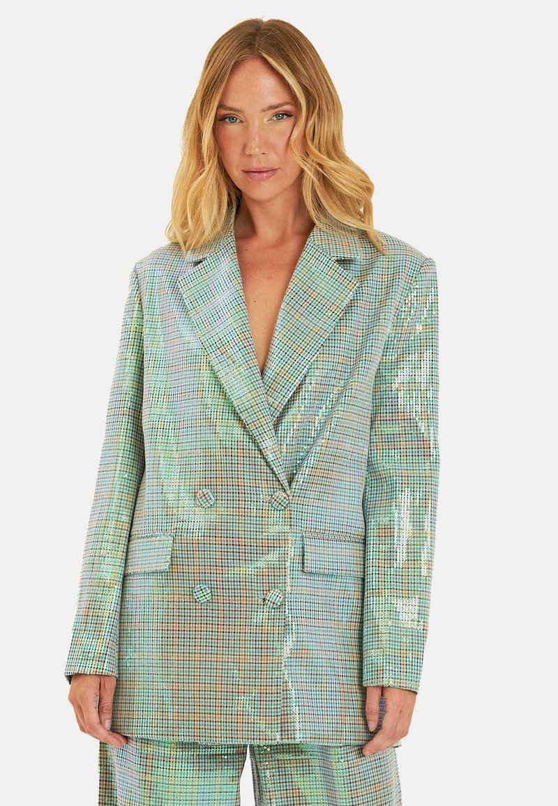 Blazer doppiopetto con un motivo a scacchi olografico in colori pastello. Caratterizzato da rever affilati e due tasche frontali in tessuto testurizzato.