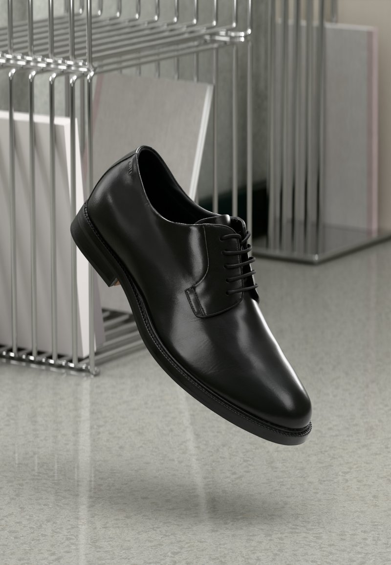 Scarpa da uomo in pelle nera con finitura liscia, punta arrotondata e design classico con stringhe. Presenta una suola testurizzata e dettagli di cucitura discreti.