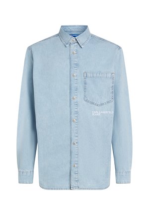 Svijetloplava traper košulja s dugim rukavima, kopčana sprijeda i s džepom na prsima. Ima vezeni logo "KARL LAGERFELD JEANS" na džepu.