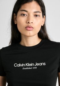 Calvin Klein Jeans INSTITUTIONAL GRAPHIC - Print T-shirt - black