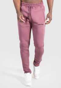 Smilodox MERRICK - Træningsbukser - violett