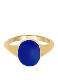 Bague en bande de or avec une grande pierre ovale bleu profond placée au centre, marquée "925" à l'intérieur de la bande.