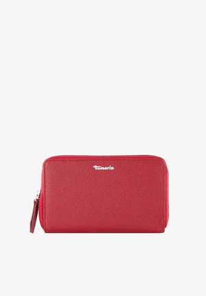 Red leather wallet with a textured finish, zip closure, and a silver logo on the front. Compact rectangular shape with a side handle.