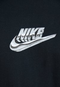 Nike Sportswear TEE - Print T-shirt - black