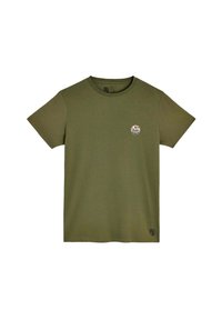 T-shirt en coton vert olive avec col rond, manches courtes et patch logo circulaire sur la poitrine. Tissu texturé, design minimaliste.