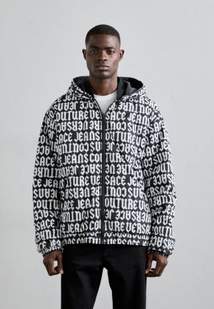 REVERSIBLE MONOGRAM - Doudoune - black/white