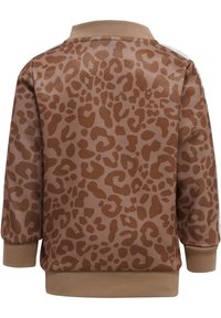 Sweatshirt marron à manches longues avec un motif léopard, des poignets et un ourlet côtelés, et une finition en tissu texturé.