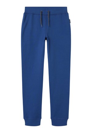 Blå joggingbukser med elastisk linning, sorte snore, sidelommer og ribkant ved anklerne.