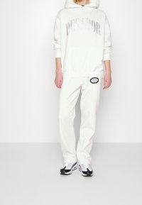 Pegador Jersey con capucha - white