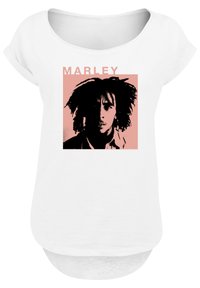 White t-shirt with a rounded neckline, featuring a pink graphic of a figure's silhouette and the text "MARLEY" above. Soft fabric texture.