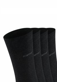 Calze crew nere realizzate in un tessuto morbido e testurizzato. Presentano un bordo a costine e un logo discreto sul lato. Confezione da quattro paia.