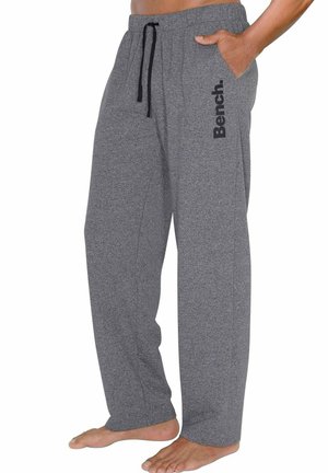 Gray, loose-fitting sweatpants made from soft material; features a black logo on the left side and an adjustable drawstring waist.