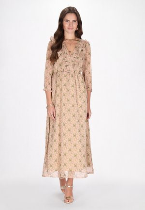 Maxikleid in Beige mit floralem Muster. Verfügt über einen Rüschenausschnitt, Dreiviertelärmel und einen elastischen Bund für eine lockere Passform.