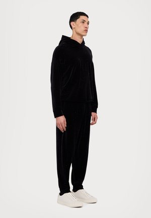 PANTALONI - Jogginghose - nero