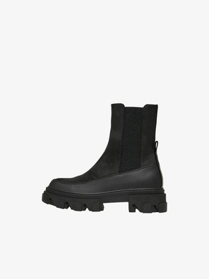 Stivali alla caviglia neri realizzati in suede e materiale sintetico, con pannelli laterali elasticizzati, suola gomma spessa e linguetta posteriore.