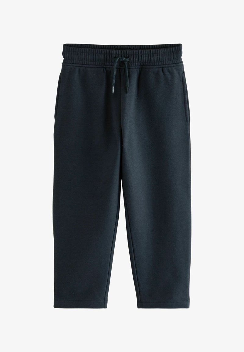 Pantalons de jogging gris foncé en matériau doux, avec une taille élastique, un cordon de serrage et des jambes fuselées sans poches visibles.