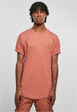 Kurzarm-T-Shirt in staubrosa Farbe, aus weicher Baumwolle gefertigt, mit rundem Ausschnitt, lockerer Passform und hochgerollten Ärmeln.