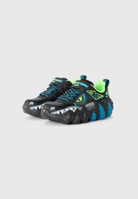 Black and blue children's sneakers with dinosaur face design, green inner lining, blue laces, and Velcro straps on a white background.