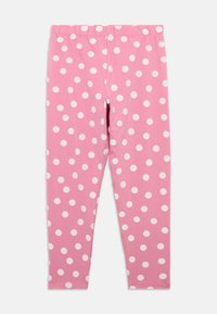 Ροζ κολάν φτιαγμένα από μαλακό ύφασμα, με λευκό πουά μοτίβο, διαθέτουν ελαστική μέση και εφαρμογή που αγκαλιάζει το σώμα.