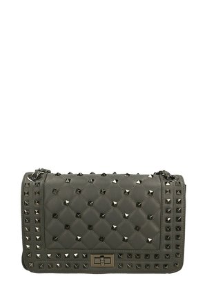 Quilted gray handbag with silver pyramid studs, chain strap, and a clasp closure. Features a rectangular shape and textured surface.