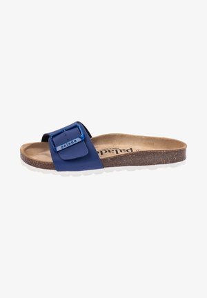 Navy slide sandal with a large blue buckle, cork footbed, and white sole. Smooth material with a contoured shape for comfort.