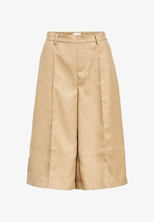 Beige kõrge vöökohaga kulotid tekstuuriga kangast, esiplekkide, küljetaskute ja laia varruka disainiga.