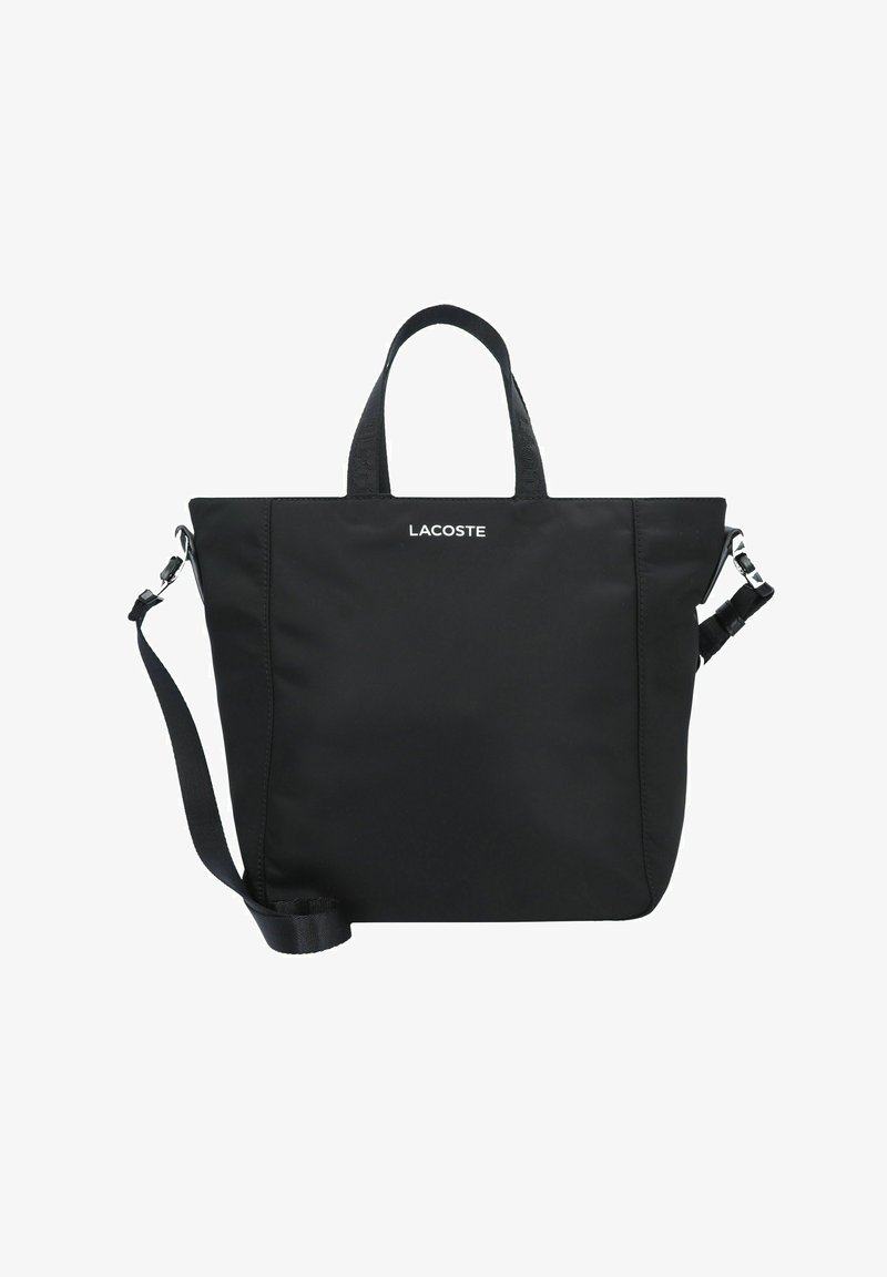 Zwarte Lacoste tote bag van soepel materiaal, met korte handvatten, een verstelbare schouderband en het logo op de voorkant.
