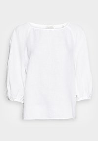 Blouse en lin blanc avec un col rond, des manches bouffantes et des poignets élastiques. Tissu texturé avec une coupe décontractée.