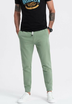 Ombre Pantaloni sportivi - green