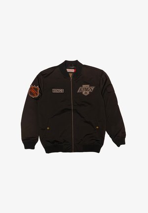 Black bomber jacket with embroidered logos, including "KINGS" and NHL shield. Features ribbed cuffs and waist, zip closure, and two side pockets.