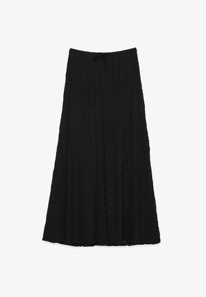 Čierna sukňa po kolená vyrobená z textúrovanej tkaniny s mriežkovým vzorom. Sťahovacia šnúrka v páse na úpravu. Vienková silueta s voľným strihom.