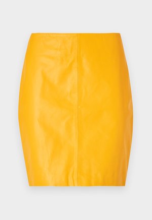 Yellow leather mini skirt with a smooth texture and fitted design. Features a central seam and a clean, sleek silhouette.