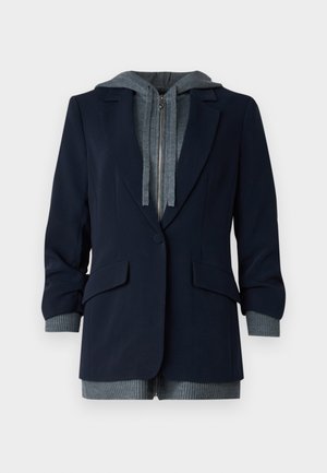 Marineblazer mit grauem Kapuzen-Innenfutter; verfügt über einen Reißverschluss, zwei Fronttaschen und gerippte Bündchen für zusätzliche Textur.