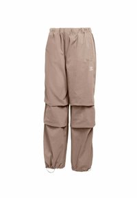 Beige lösa byxor i lätt material med elastisk midja, prydda med en logotyp och med uppvikta ändar för en avsmalnad look.