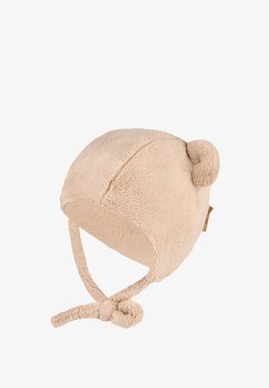 Beige weiche Plüsch-Babymütze mit Ohrenschlägen, gebundenen Kinnriemen und einem kleinen runden Stoffohr oben.