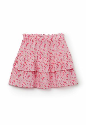 Rosa gestufter Rock mit elastischem Bund, bedeckt mit kleinem roten und weißen Blumenmuster.